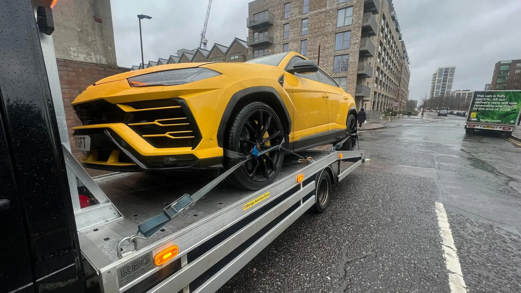 yellow-luxury-car-being-towed-by-recover-u-away